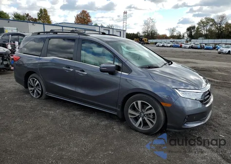 2022 Honda Odyssey Touring z USA, uszkodzony, nr VIN 5FNRL6H83NB027682